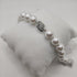 Bracciale Liu Jo LJ1665 Perle con ciondolo logo | Gioiellitosti.it