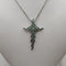 Croce con diamanti e Smeraldi e collana oro 18k | Gioiellitosti.it