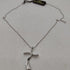 Croce in diamanti stilizzata e collana oro 18k | Gioiellitosti.it
