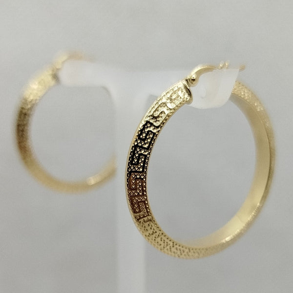 Orecchini a cerchio con greca oro 18 kt 3.10cm | Gioiellitosti.it