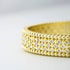 Bracciale Rigido Boccadamo XB1050D Acciaio dorato e Zirconi
