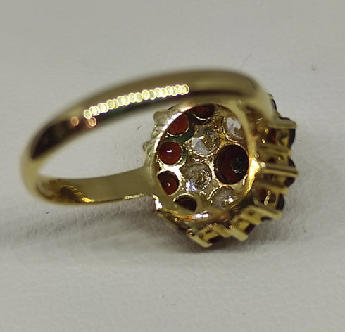 Anello oro 18 kt donna con granato rosso e zirconi forma Fiore | Gioiellitosti.it