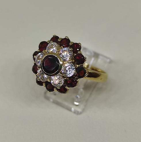 Anello oro 18 kt donna con granato rosso e zirconi forma Fiore | Gioiellitosti.it
