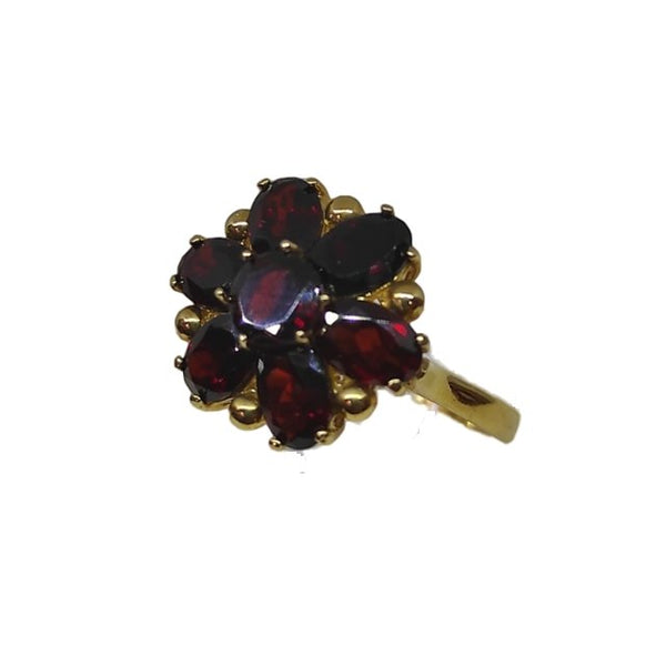 Anello oro 18 kt donna con pietre granato rosso forma Fiore | Gioiellitosti.it