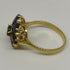 Anello oro 18 kt donna con pietre granato rosso forma Fiore | Gioiellitosti.it