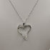 Collana ciondolo cuore oro bianco 18k diamanti 0,13 F | Gioiellitosti.it