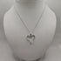 Collana ciondolo cuore oro bianco 18k diamanti 0,13 F | Gioiellitosti.it