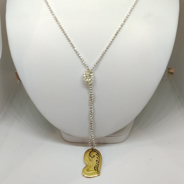 Collana Guess donna acciaio con pendente cuore e logo | Gioiellitosti.it