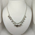 Collana Guess donna acciaio con pendenti cuore e sfere | Gioiellitosti.it