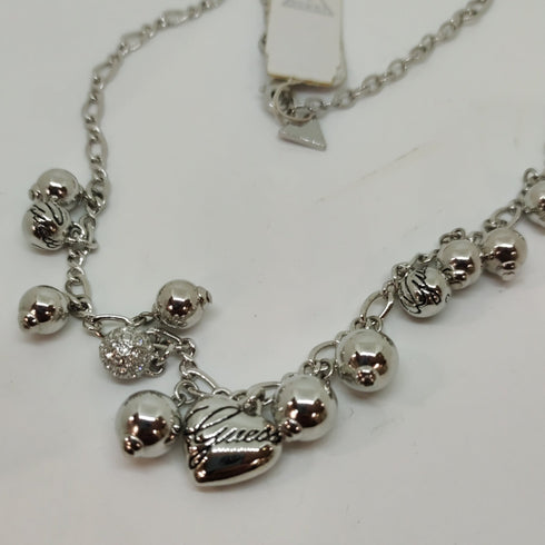 Collana Guess donna acciaio con pendenti cuore e sfere | Gioiellitosti.it