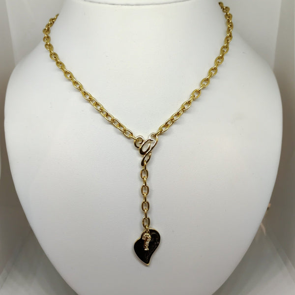 Collana Guess donna Girocollo acciaio dorato con pendente cuore | Gioiellitosti.it