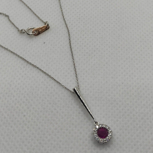 Collana Punto Luce oro bianco 18k diamanti rubino | Gioiellitosti.it