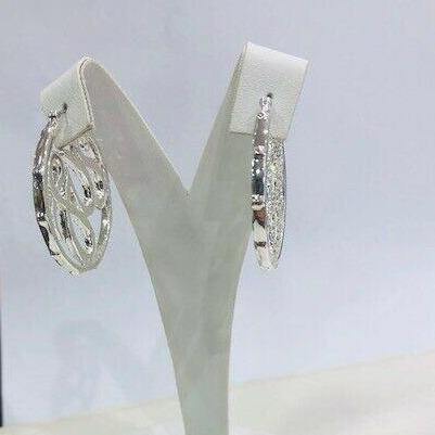 Guess UBE20803 Orecchini donna pendenti a cerchio | Gioiellitosti.it