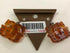 Guess UFE70727 Orecchini resina color brunito | Gioiellitosti.it
