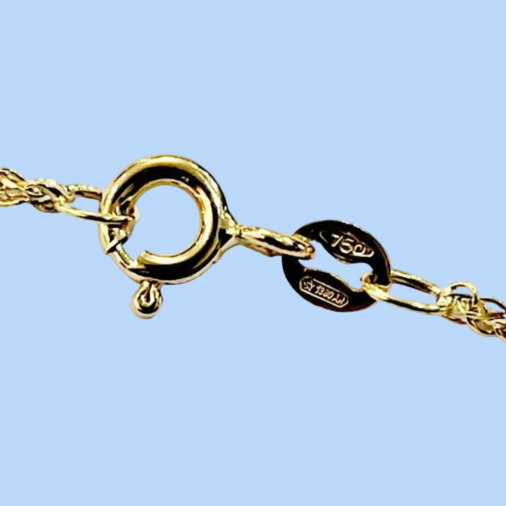 Punzone 750 su gioiello in oro 18k — differenze tra oro 18k, 14k e 9k, guida Gioielleria Tosti