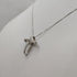 Croce con diamanti e Collana oro 18k bianco | Gioiellitosti.it