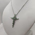 Croce con diamanti e Smeraldi e collana oro 18k | Gioiellitosti.it