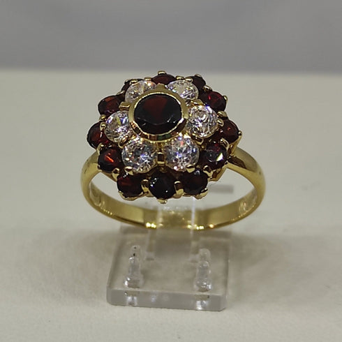 Anello oro 18 kt donna con granato rosso e zirconi forma Fiore | Gioiellitosti.it