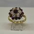 Anello oro 18 kt donna con granato rosso e zirconi forma Fiore | Gioiellitosti.it