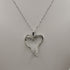Collana ciondolo cuore oro bianco 18k diamanti 0,13 F | Gioiellitosti.it
