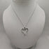 Collana ciondolo cuore oro bianco 18k diamanti 0,13 F | Gioiellitosti.it