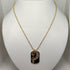 Collana Guess donna acciaio dorato con pendente | Gioiellitosti.it