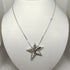 Collana Guess donna Girocollo in acciaio con pendente stella | Gioiellitosti.it